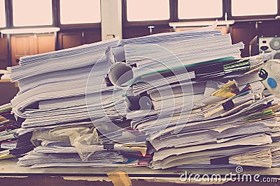 Pile of papers laid overlap on the desk Stock Photo