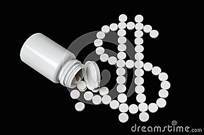 Pile of pills in shape dollar - medical expenses concept Stock Photo