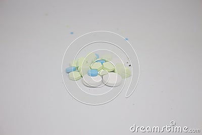 A pile of pills and tablets isolated on a white background Stock Photo