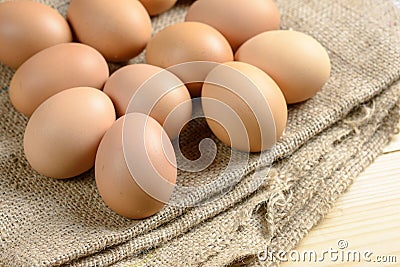 Fresh eggs on hemp sack Stock Photo