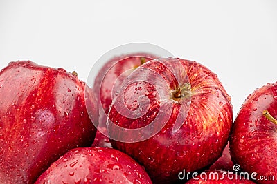 Pile of red appl with clear water drop on shell surface texture pattern isolated Stock Photo