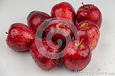 Pile of red apple with clear water drop on shell surface texture pattern isolated Stock Photo