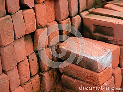 PILE OF RED CLAY BRICKS Stock Photo