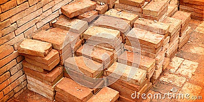 Pile of red clay bricks Stock Photo