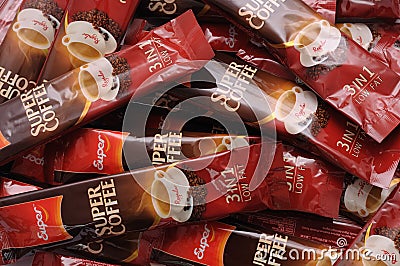 A pile of regular flavoured super instant coffee beverage sachets Editorial Stock Photo