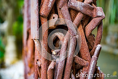 A pile of rusty water pipes and scrap iron twisted together Stock Photo