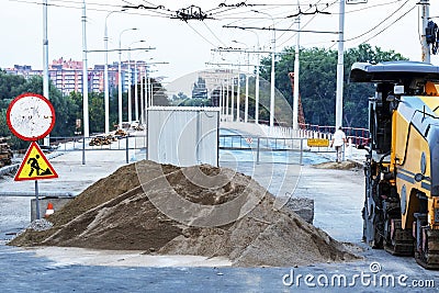 Pile of sand.Heap of sand. Loose construction material. Stock Photo