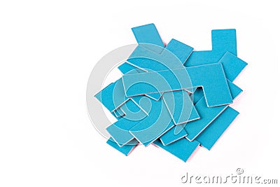 Pile of scattered blue geometrical pieces, simple shapes stack, heap Bunch of unlinked not connected elements isolated on white Stock Photo