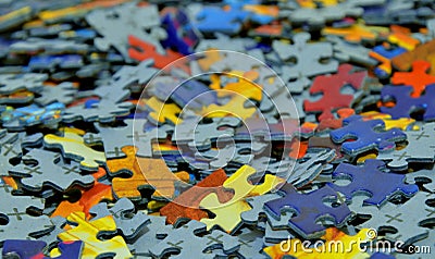 Pile of scattered puzzle pieces Stock Photo