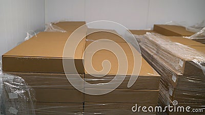 Flat cardboard boxes in stock. A pile of shipping boxes Stock Photo