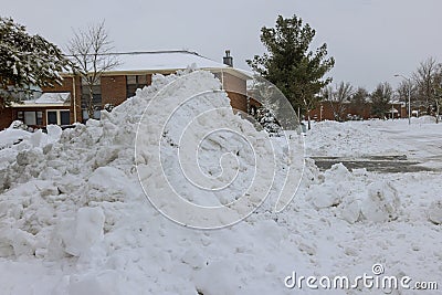 A pile of snow with removed beside of snow after a very heavy snowfall Stock Photo