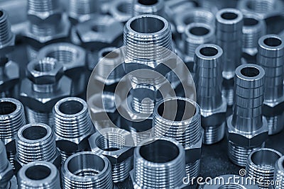 The pile of special industrial pipeline connector parts. Stock Photo