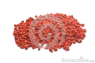 Pile of spices red achiote seeds on white background Stock Photo