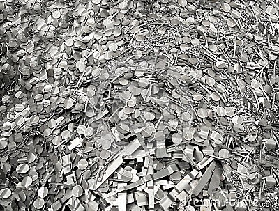 Pile of steel scrap, scrap from cold stamping sheet metal cutting process, punching waste, material for recycling Stock Photo