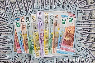 pile of two leading currencies - the US dollar and euro banknotes. Stock Photo