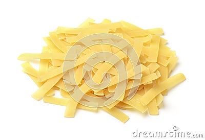 Pile of uncooked short cut ribbon pasta Stock Photo