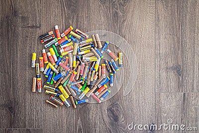 Pile of used AA and AAA batteries Editorial Stock Photo