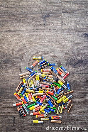 Pile of used AA and AAA batteries for recycling Editorial Stock Photo