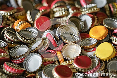 Pile of used alluminum beer bottle corks for metal recycling,garbage trash recycle Stock Photo