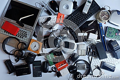 Pile of used Electronic Waste on white background Stock Photo