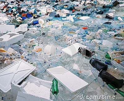 Pile of waste plastic bottles and other trash - human impact on environmental damage concept Stock Photo