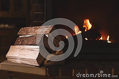 Pile of wood near fireplace. Winter vacation Stock Photo