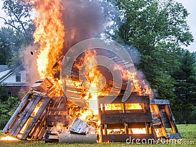 Raging Bonfire. Pile of burning pallets Stock Photo