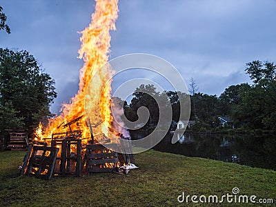 Raging Bonfire. Pile of burning pallets Stock Photo