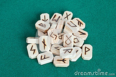 Pile of wooden tiles with fortunetelling runes Editorial Stock Photo