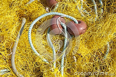 Pile of yellow fishing net Stock Photo