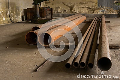 Piled Old, rusty, dirty pipes Stock Photo