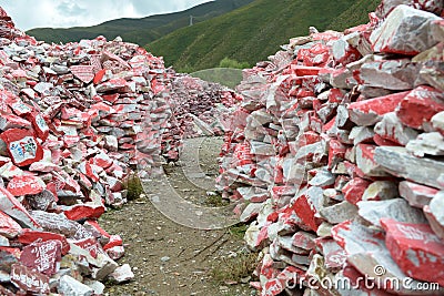 Piles of Mani stones with Six-word Theory Editorial Stock Photo