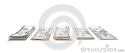 Piles of various dollar notes Stock Photo