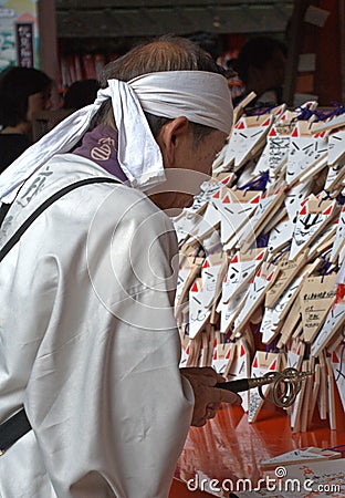 Pilgrim at Fushimi Inari Temple, Kyoto, Japan Editorial Stock Photo