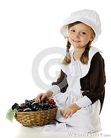 Pilgrim Girl's Fruit Basket Stock Photo