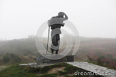 Pilgrim in the rain Stock Photo