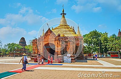 Pilgrims on Alo-daw Pyi Pagoda grounds, Bagan, Myanmar Editorial Stock Photo