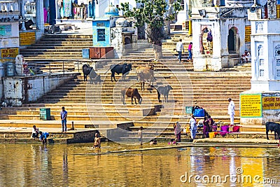 Pilgrims at a Bathing Ghat at Pushkar's Holy Lake Editorial Stock Photo