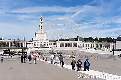 Pilgrims crawling on their knees to the shrine at Fatima Editorial Stock Photo