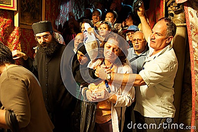 Pilgrims from Egyptian christian copt In the Church of the Nativity, Bethlehem. Editorial Stock Photo