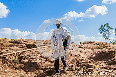 Pilgrims going to the Church for pray in African town Editorial Stock Photo