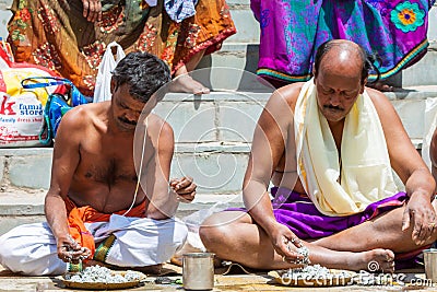 Pilgrims offers prayers to their ancestors Editorial Stock Photo