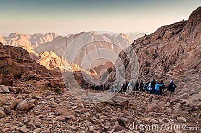 Pilgrims and tourists on the pathway from the Mount Sinai peak Editorial Stock Photo