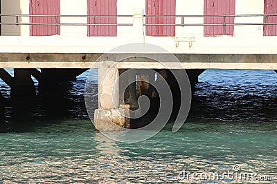 Piling of reinforced concrete in seawater Stock Photo