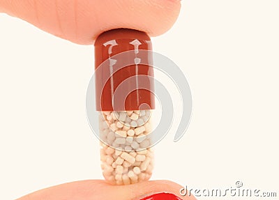 pill in hand on the white background Stock Photo