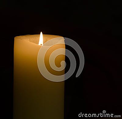 Pillar Candle burning Stock Photo