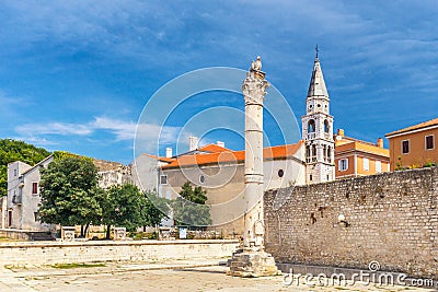 Pillar of Shame and Saint Elias church in center of Zadar. Stock Photo