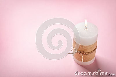 Pillar wax candle burning Stock Photo