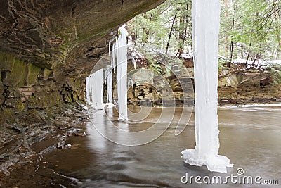 Pillars of Ice attached to Rock Overhang Stock Photo