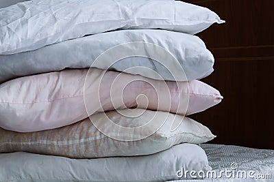 Pillow column on the bed Stock Photo